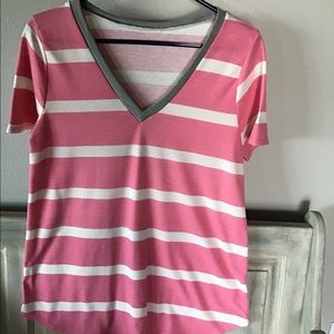 Pink and white striped V neck top.
